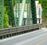 Bridge rail with TGIC covering.